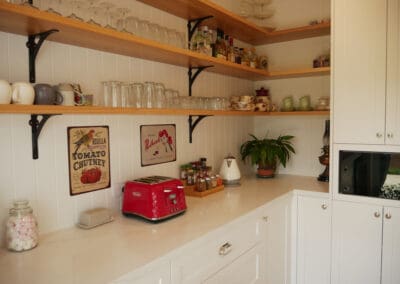 Butler's pantry in a light-filled, stylish country kitchen in Robertson, featuring ample storage and modern design.