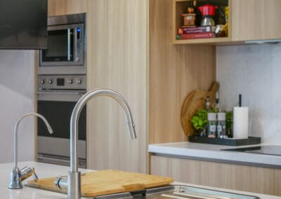 Gareth Ashton gooseneck pull-out mixer tap in Comtemporary Two-Toned Kitchen.