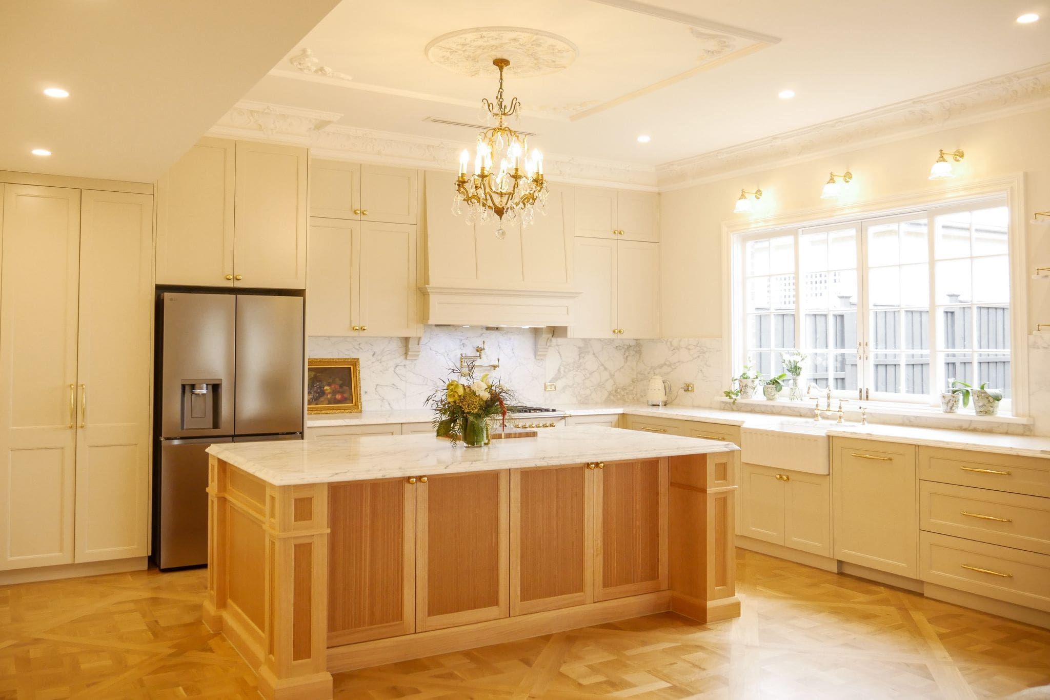 modern french provincial kitchen with class detailing and timber island